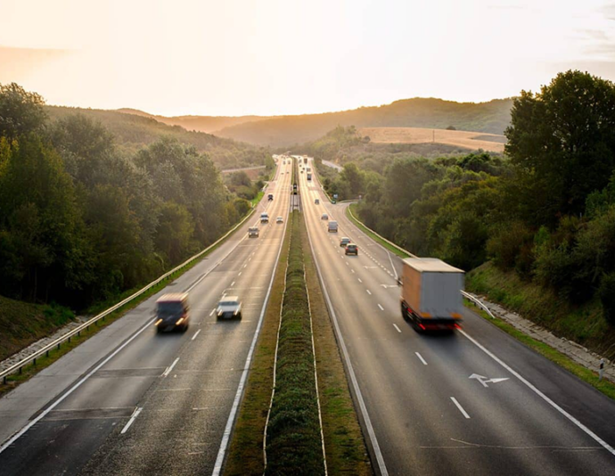 A view of the highway showing traffic moving to and away from the camera